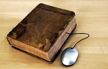 Bible and computer mouse