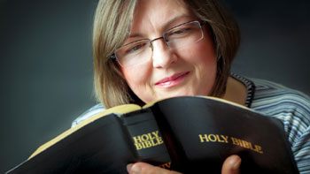 Woman enjoying her Bible (H. Riana)