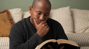 Man studying Bible (cmlnc)